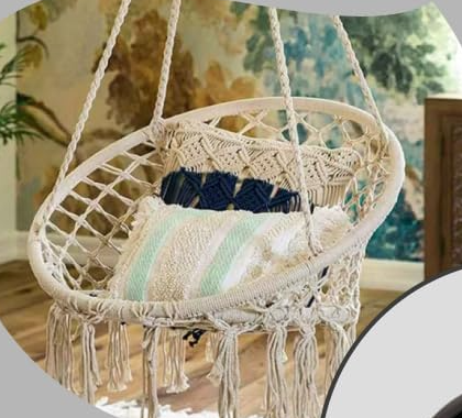 Macramé hammock chair hanging from a ceiling hook